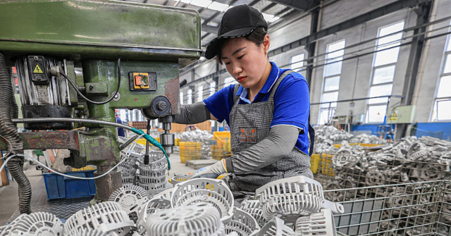protests-erupt-across-china-as-factories,-schools,-and-construction-sites-struggle-to-pay-workers