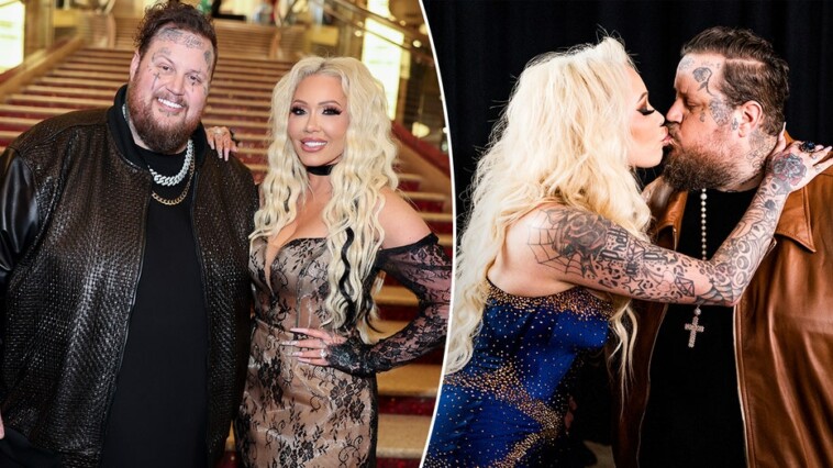 jelly-roll’s-wife-grabs-country-star’s-attention-with-risque-move-at-hockey-rink
