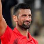 weather-irks-djokovic-in-1st-rd.-french-open-win