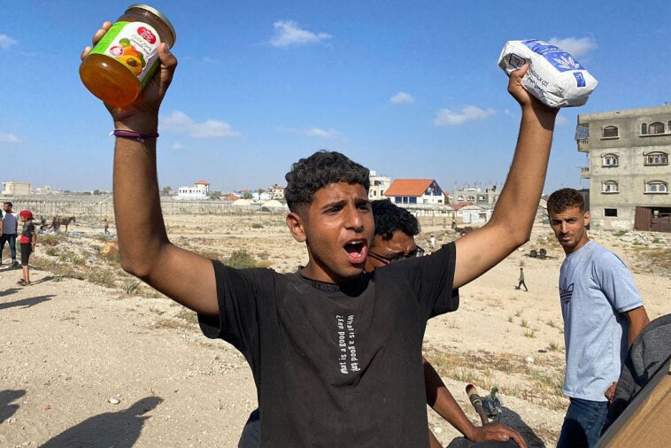 watch:-us.-backed-gaza-aid-centers-see-chaos,-‘thank-you-america’-cheers,-and-500k-meals-on-day-one