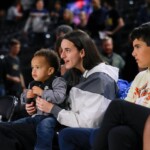 caitlin-clark-seen-carrying-a-baby-at-indiana-fever-game-amid-injury-absence