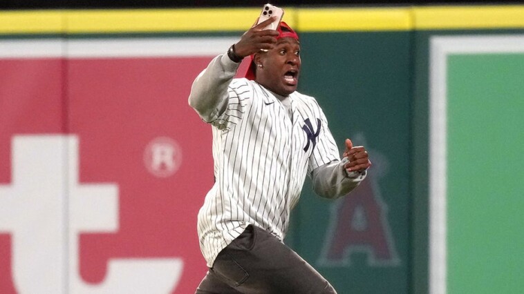 yankees-fan-jukes-out-security-on-field-before-being-handcuffed,-catches-it-all-on-camera