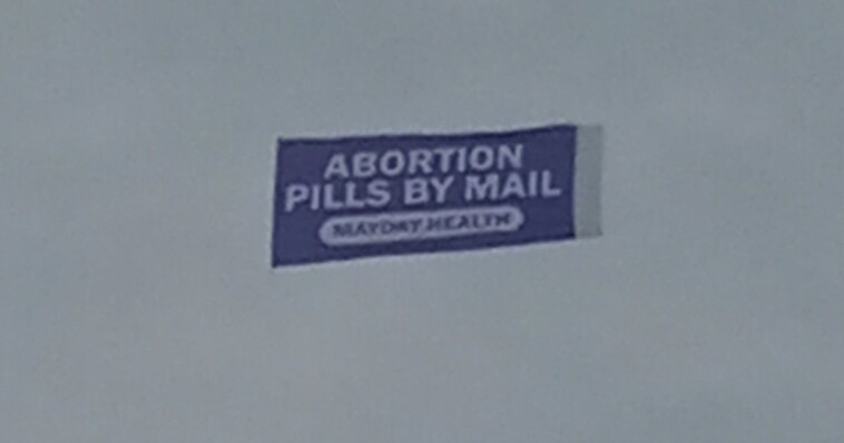 plane-flies-over-indy-500-with-disgusting-message-on-banner-behind-it