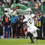 saquon-barkley-unveiled-as-‘madden-nfl-26’-cover-star-with-famous-backwards-hurdle