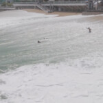 drone-video-captures-moment-giant-wave-swallows-up-swimmers-on-mexican-beach