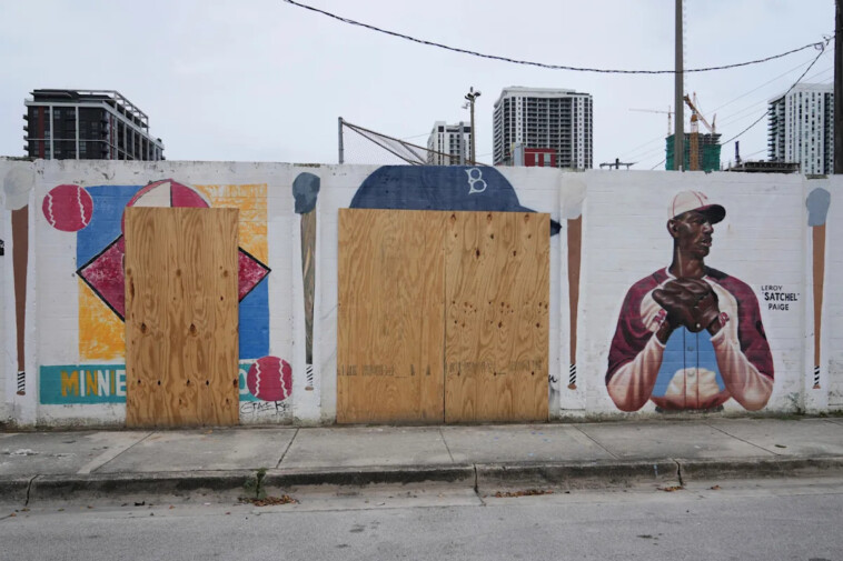 jackie-robinson,-minnie-minoso-murals-defaced-with-racial-slurs-and-swastikas-in-miami
