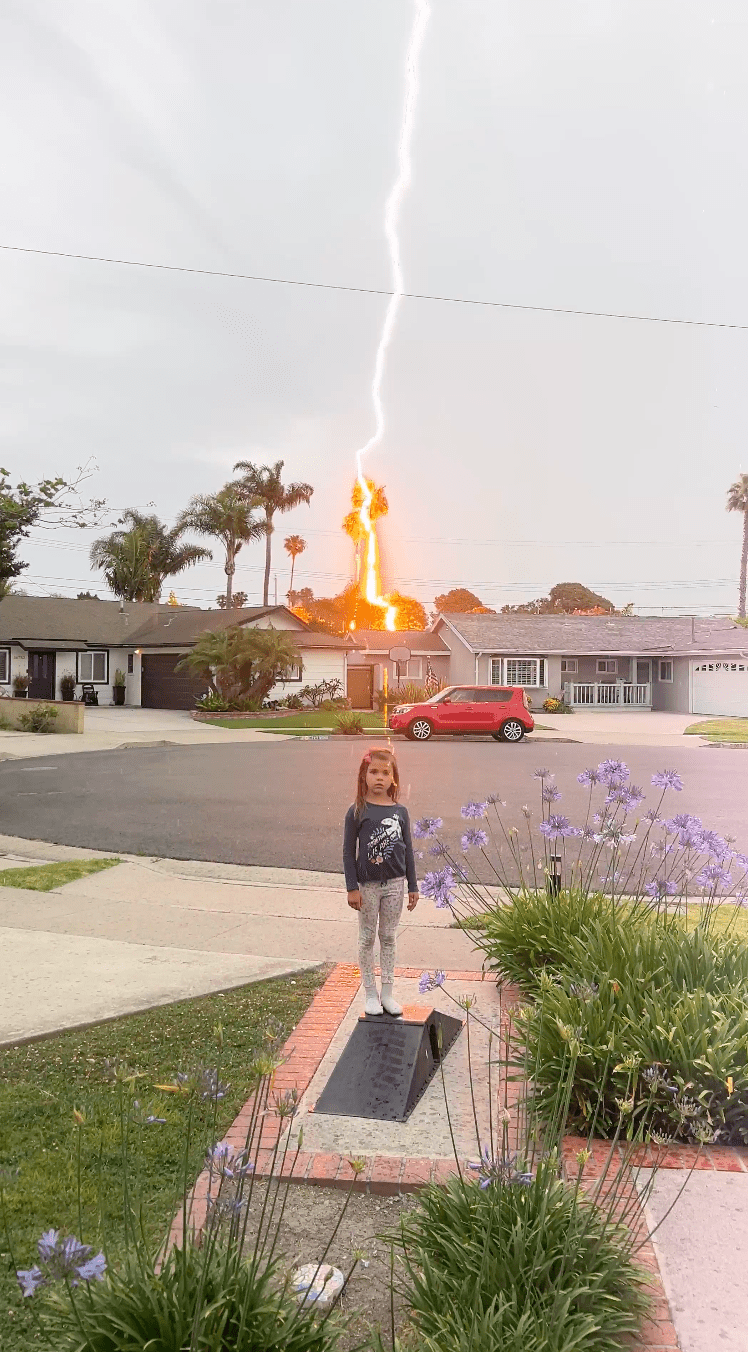 lightning-bolt-strikes-just-behind-child-during-california-thunderstorms