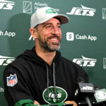 aaron-rodgers-fuels-marriage-rumors-with-sneaky-ring-appearance-in-steelers-contract-photo