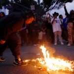 anti-ice-protesters-in-los-angeles-spit-on-and-burn-american-flag