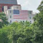 the-message-behind-an-american-flag-flying-across-from-the-white-house