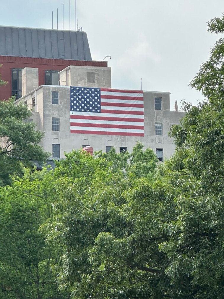 the-message-behind-an-american-flag-flying-across-from-the-white-house