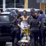 wild-video-shows-naked-man-dancing-on-top-of-moving-cop-car-in-calif.