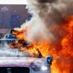 rioters-torch-waymo-self-driving-taxis-in-downtown-la.