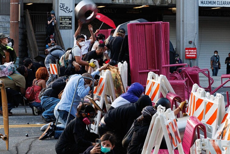 organized-mob:-anti-ice-protesters-are-sharing-law-enforcement-movements-via-two-way-radios