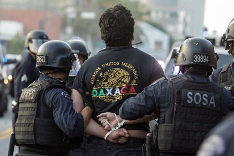 watch:-la.-police-detain-reporter-live-on-air-during-anti-ice-riots