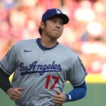 shohei-ohtani-leaves-dodgers-game-as-pitcher-vs-reds,-but-returns-to-bat