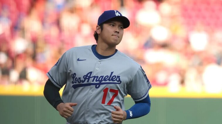 shohei-ohtani-leaves-dodgers-game-as-pitcher-vs-reds,-but-returns-to-bat