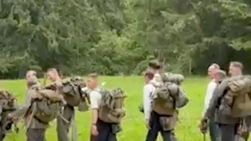 hikers-dressed-as-nazi-soldiers-are-stopped-by-police,-ordered-to-remove-offensive-symbols