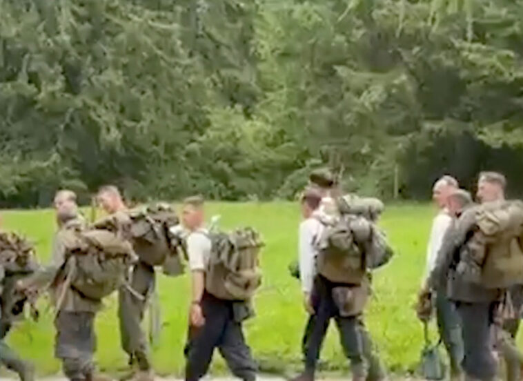 hikers-dressed-as-nazi-soldiers-are-stopped-by-police,-ordered-to-remove-offensive-symbols