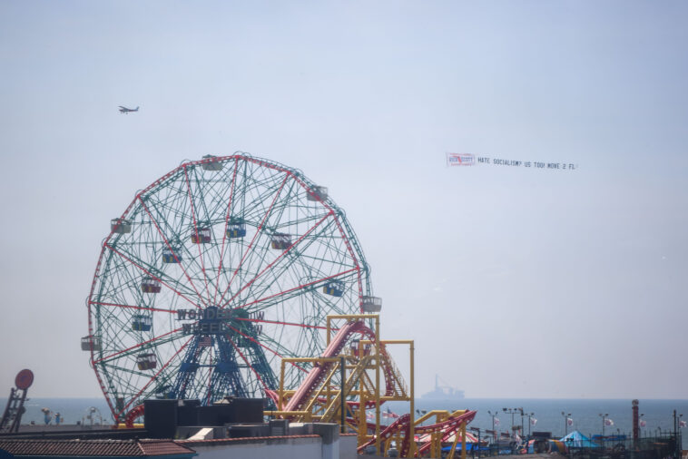 rick-scott-summons-nyers-to-florida-with-sky-high-advertisement