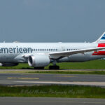 passengers-use-emergency-slide-to-evacuate-after-landing-gear-of-american-airlines-plane-catches-fire-at-denver-airport-(video)