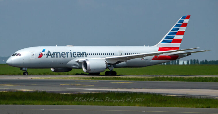 passengers-use-emergency-slide-to-evacuate-after-landing-gear-of-american-airlines-plane-catches-fire-at-denver-airport-(video)