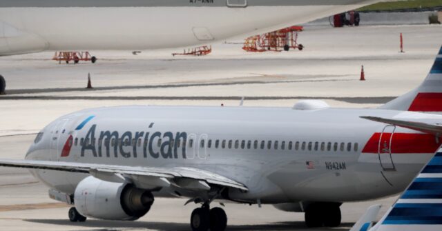 watch:-‘panicking’-travelers-exit-american-airlines-plane-via-slides-due-to-fire-at-denver-airport