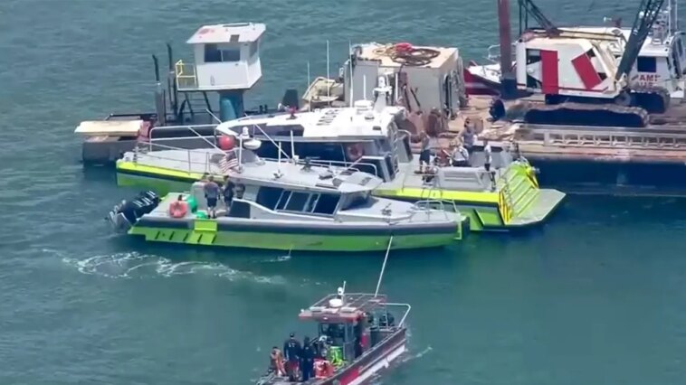 sailboat-sinks-near-miami-beach-after-crash-with-barge,-leaving-6-hospitalized