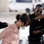 australia-charges-chinese-woman-for-allegedly-spying-on-local-buddhists