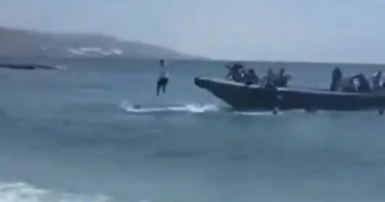watch:-beachgoers-take-matters-into-their-own-hands-when-a-boatload-of-illegal-aliens-washes-ashore