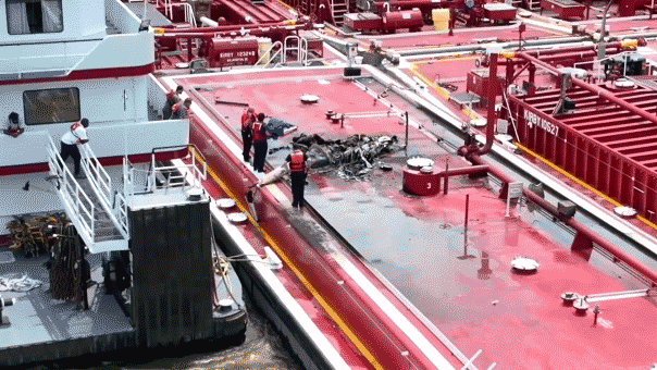 two-people-killed-after-helicopter-hits-power-line-and-crashes-into-barge-on-mississippi-river