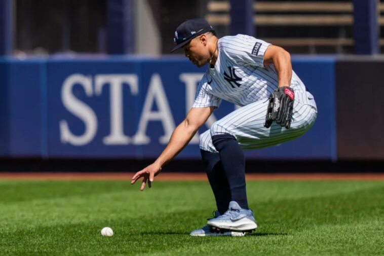 giancarlo-stanton-holds-his-own-during-first-outfield-chance-in-two-years