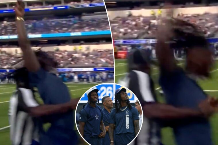 cowboys-star-ceedee-lamb-takes-big-hit-from-sprinting-official-while-on-sideline