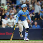 brewers-beat-mets-in-walk-off-after-playing-game-as-scheduled-despite-flooding,-road-closures