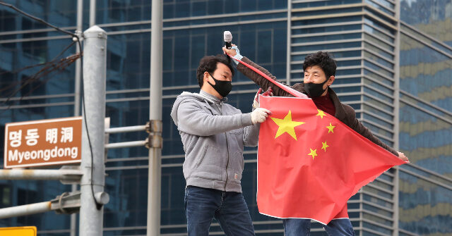 south-korea-launches-police-probe-against-conservatives-for-tearing-chinese-flag