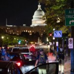 protesters-confront-officers-patrolling-dc-streets-after-trump-policing-takeover