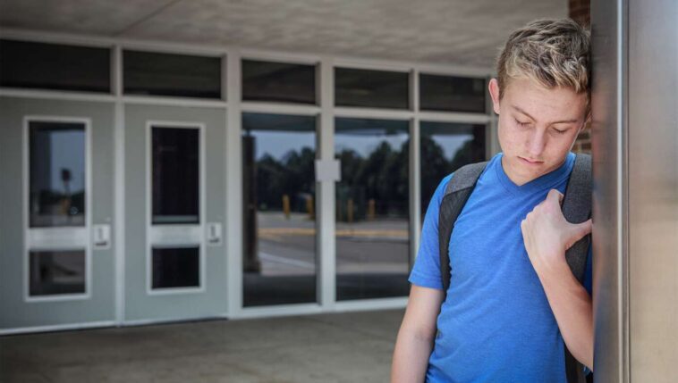 highschool-freshman-disappointed-there-isn’t-an-affable-loner-around-on-first-day-of-school-to-point-out-which-tables-in-the-lunch-room-various-social-groups-sit-at