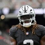 ashton-jeanty-has-an-injury-scare-after-hard-hit,-but-returns-to-game-and-scores-td