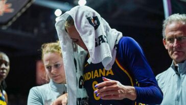 sophie-cunningham-helped-off-court-after-brutal-knee-injury-forces-early-exit-from-fever-game