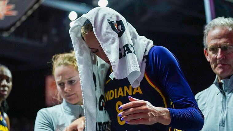 sophie-cunningham-helped-off-court-after-brutal-knee-injury-forces-early-exit-from-fever-game