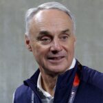 mlb’s-rob-manfred-teases-realignment-with-expansion,-baseball-fans-torch-idea