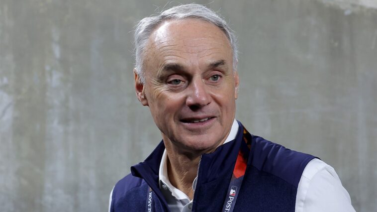 mlb’s-rob-manfred-teases-realignment-with-expansion,-baseball-fans-torch-idea