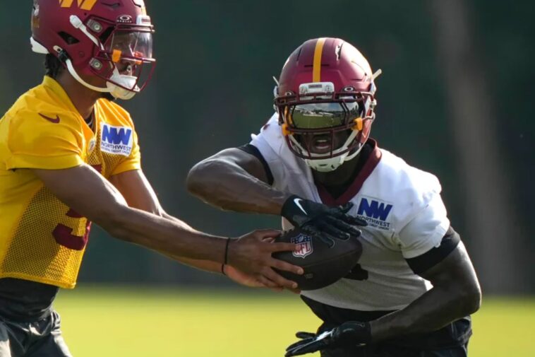 brian-robinson-jr.-excused-from-commanders-practice-as-trade-rumors-linger
