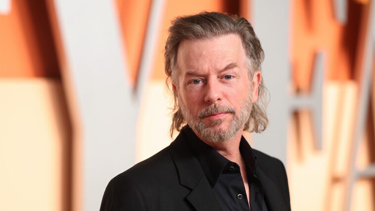 david-spade-reveals-he-considered-getting-his-gun-after-autograph-hunters-followed-him-to-his-house