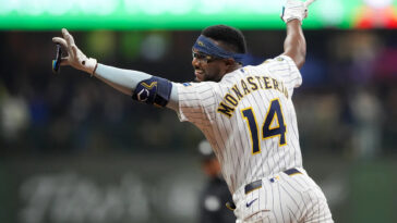 brewers-clinch-mlb’s-first-playoff-spot,-then-rally-to-walk-off-cardinals-in-extra-innings