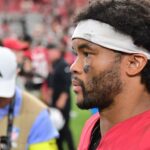 cards’-murray-sorry-for-post-with-vick-jersey,-dog