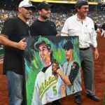 ex-pirates-ss-wilson-recreates-1st-pitch-to-son