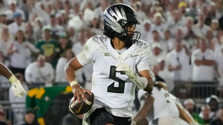 how-oregon’s-dante-moore,-indiana’s-fernando-mendoza-became-unlikely-nfl-darlings