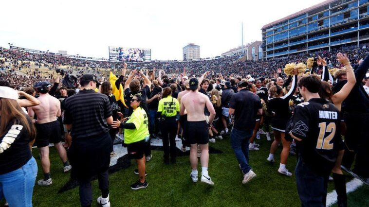 sanders-endorses-fans-rushing-field-as-fine-looms