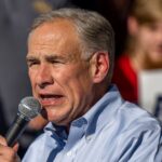 greg-abbott-faces-scrutiny-as-texas-hands-vehicle-registrations-to-illegal-immigrants